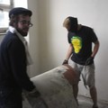 David Chejn and Martin Huml are cleaning the National Gallery library